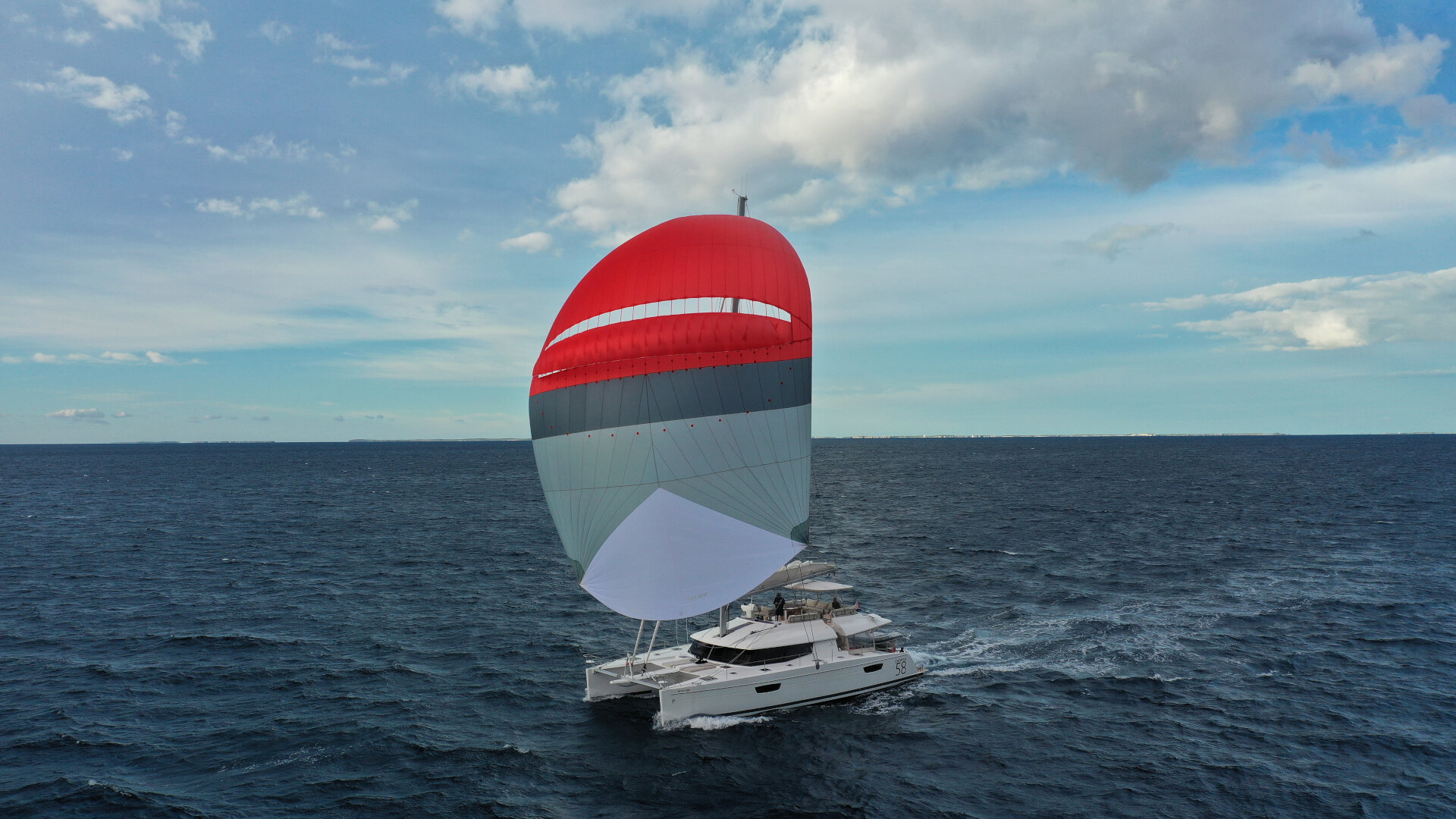 Image showing the unique characteristics of the Oxley Self Stabilizing Sail on an Ipanema 58 advanced, flagship catamaran. 